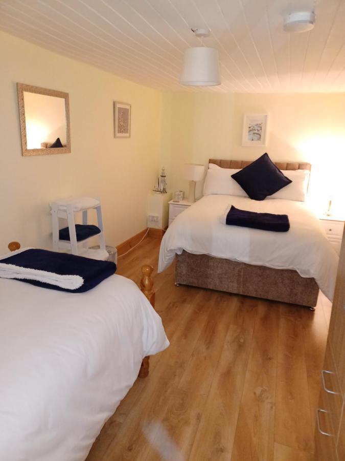 Kents Guesthouse Accommodation Kilmacthomas Quarto foto